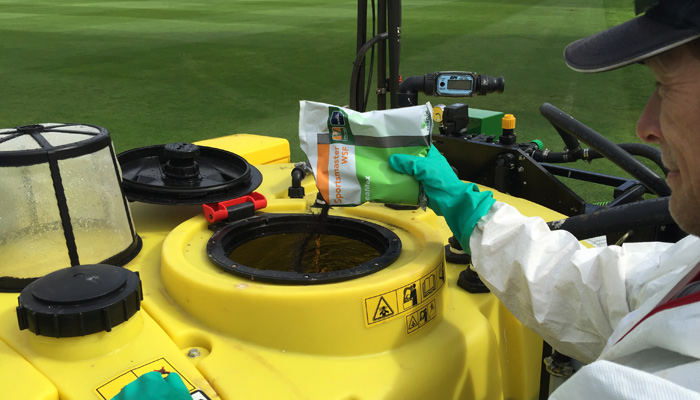 Sedbergh School Martin South, Head Groundsman at Sedbergh School adds Sportsmaster SeaMax WSF to the spray tank.